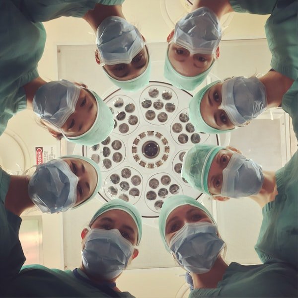 Medical specialist and clinical pathologist analyzing diagnostic laboratory specimens